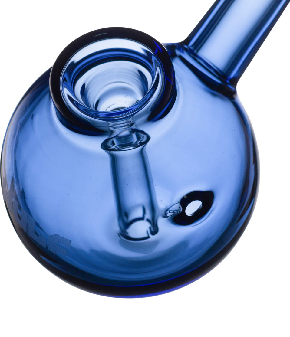 Close-up of a blue glass bubbler bowl on a white background