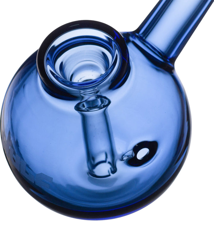 Close-up of a blue glass bubbler bowl on a white background