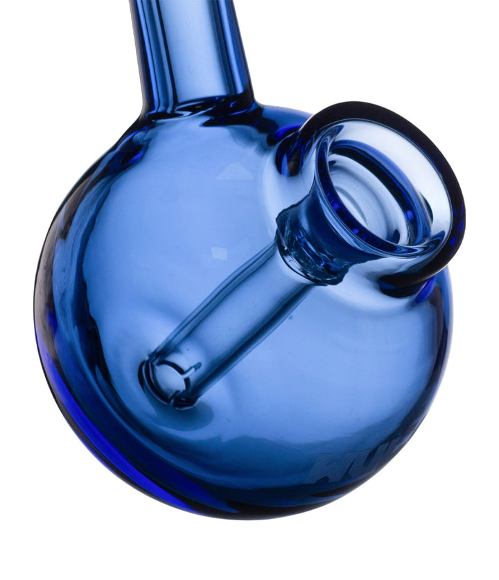 Close-up of a blue glass bubbler tube on a white background
